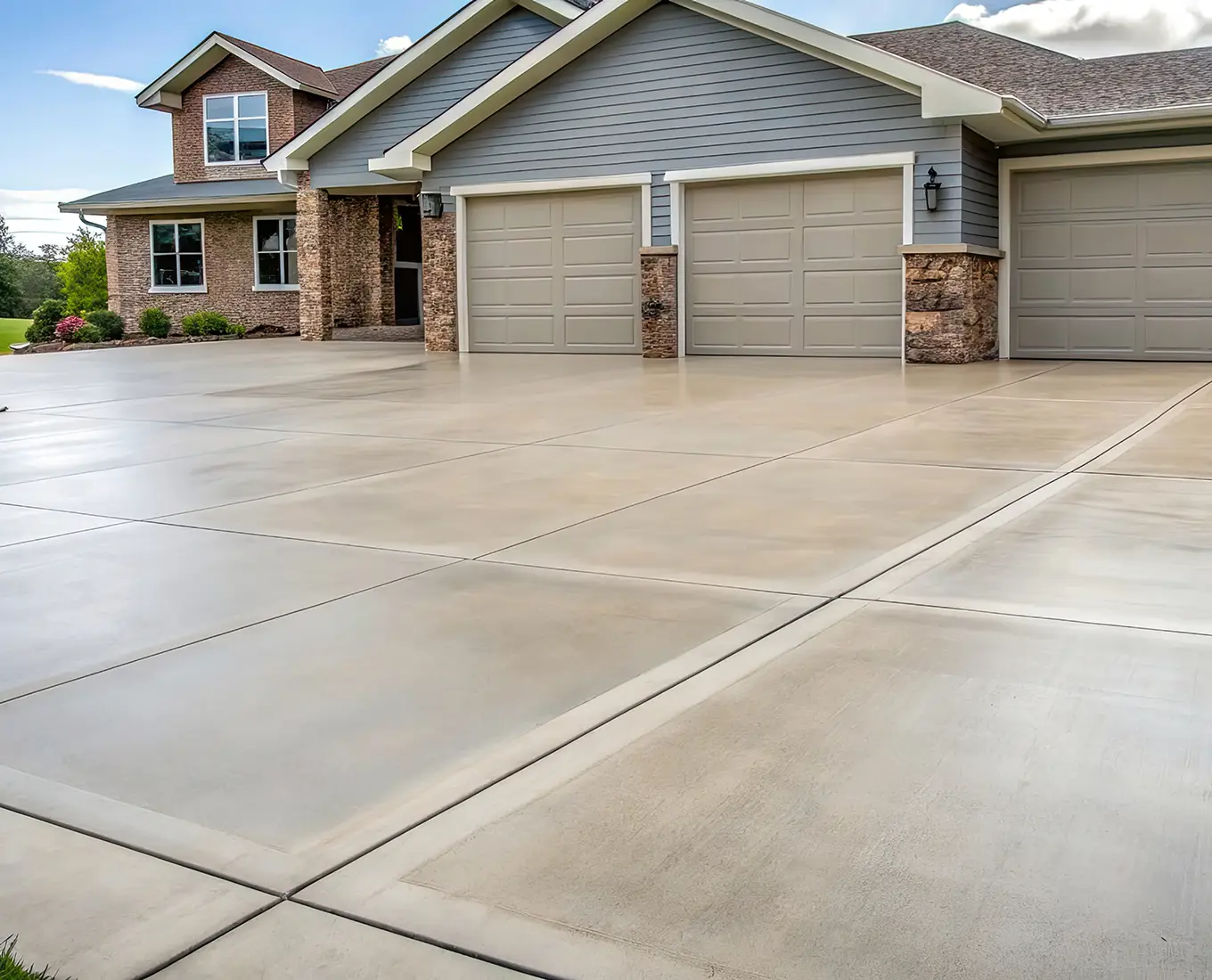 Smooth concrete driveway for large house in canton ga