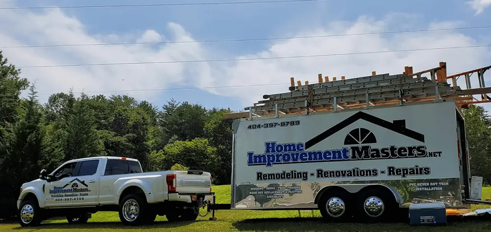 home improvement master truck with trailer and ladders in canton ga