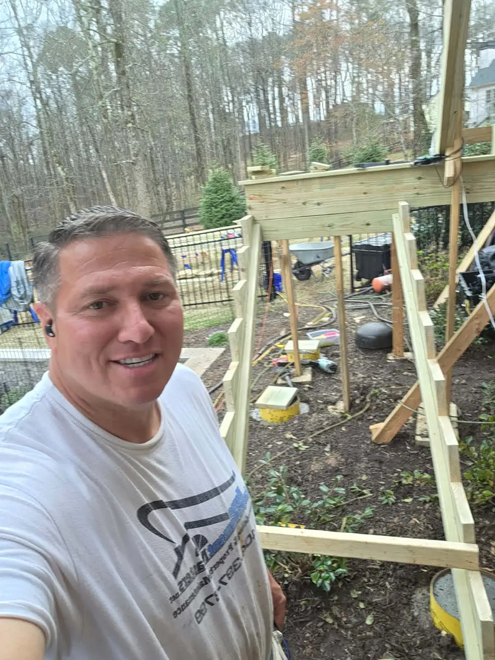 craig next to deck stairs in canton ga