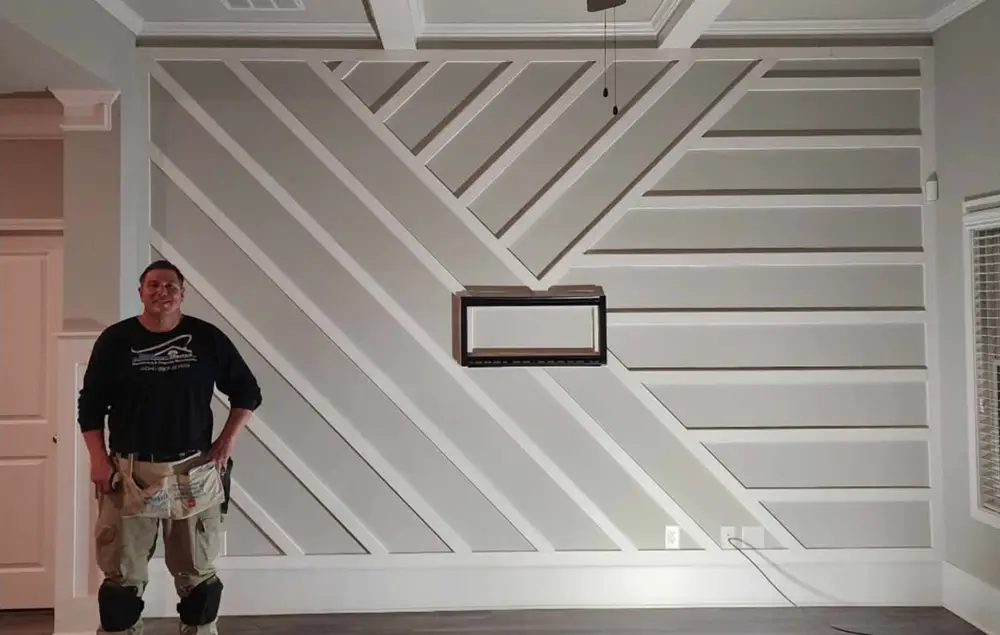 craig next to custom wall in house in canton ga