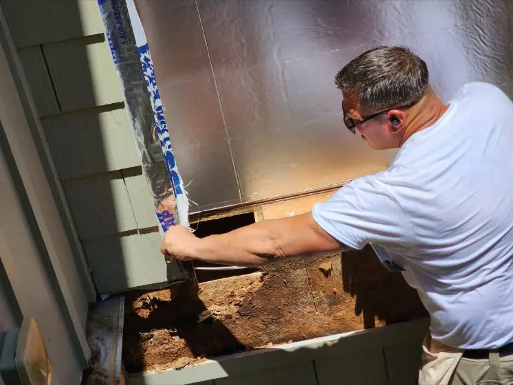 craig working on section of the house in canton ga