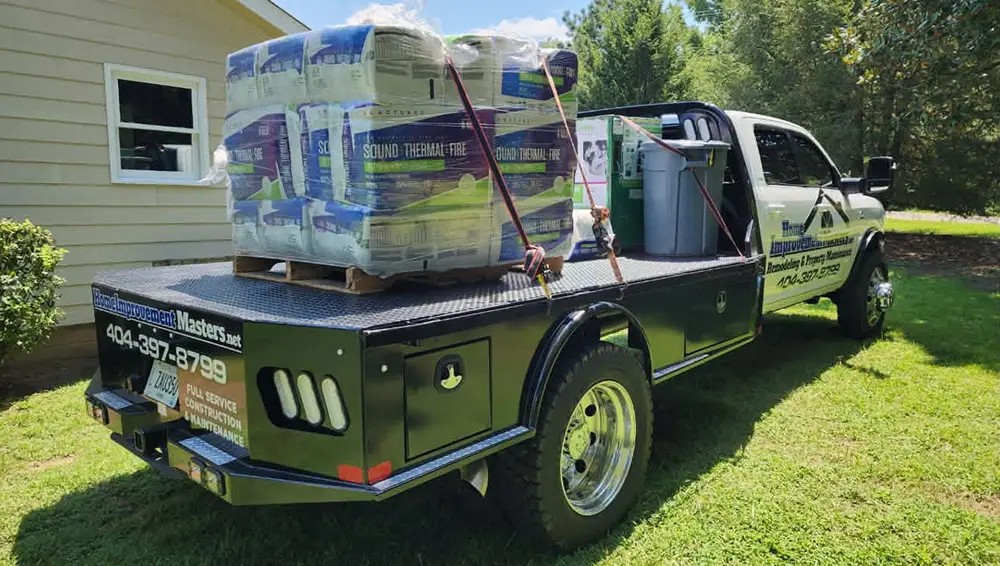 home improvement master flatbed carrying equipment in canton ga